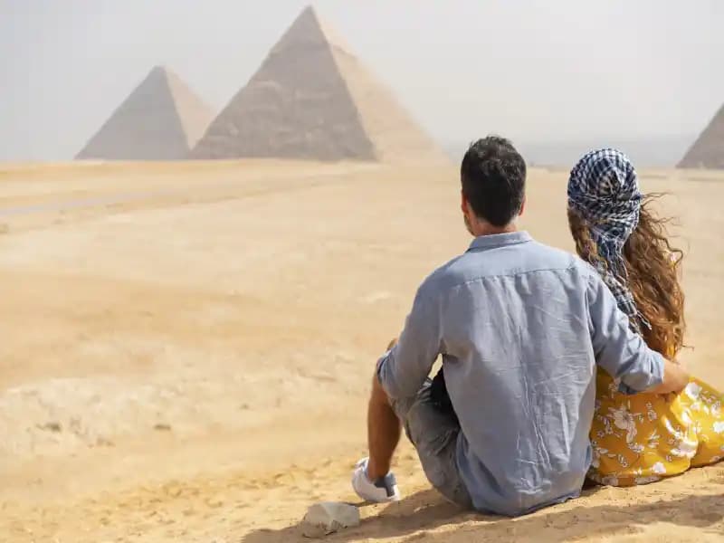 Tourists in Giza Pyramids Tourists in Giza Pyramids